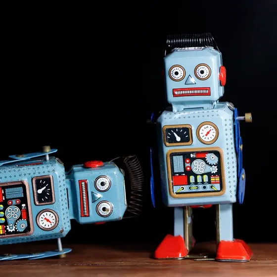 Vintage blue tin wind-up robots